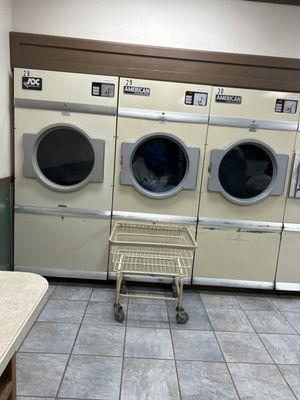 Large dryers in back room, to the right are the large washers for 4.00 a wash