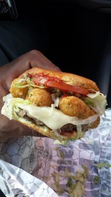 Cheeseburger with mozzarella sticks.