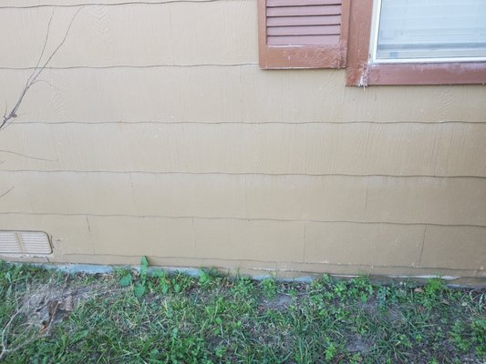 Asbestos-containing transite siding