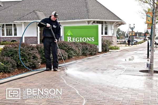 Pressure washing paint off of sidewalks