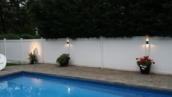 Added accent lighting around the pool after the new patio.