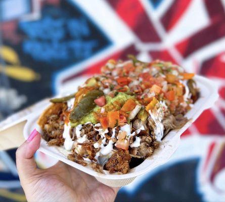 Super Baby Nachos w/ carnitas y lengua | $12.95