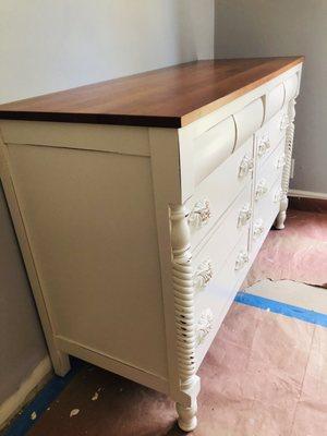 Cherry wood dresser refinished in a distressed white with cherry top.