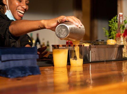 Hire a Bartender Now serving up delicious cocktails