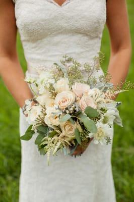 Seeded eucalyptus. astilbe, scabiosa, dusty miller and roses