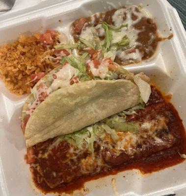 Cheese enchilada and chicken taco combination plate