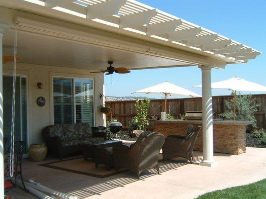 A solid patio cover creates the perfect outdoor living space.