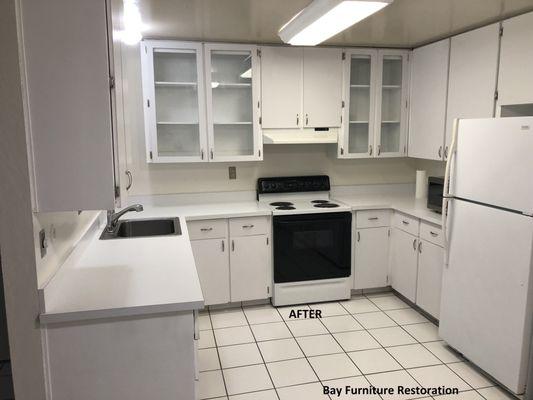 the after of the kitchen cabinets and counter tops. we add glass windows using the existing frames