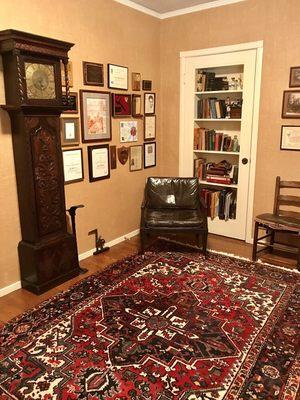 Den with rug purchased from Mansour and recently cleaned by his service.