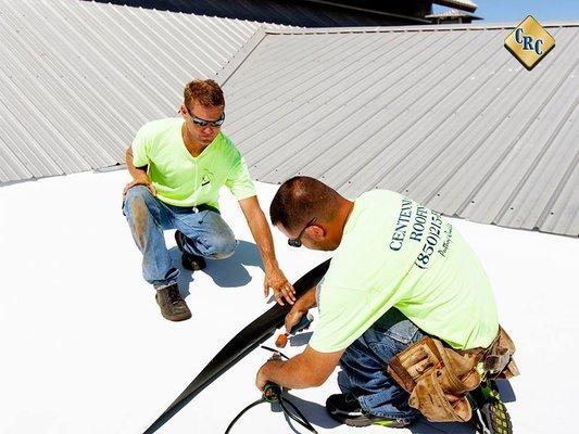 Installing a combination single ply and metal roof system on Grand Marlin Restaurant