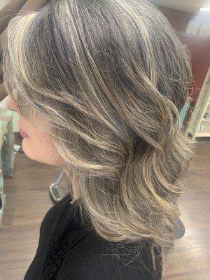 Light, bright blonde on very dark hair for a soft grow out and minimal maintenance