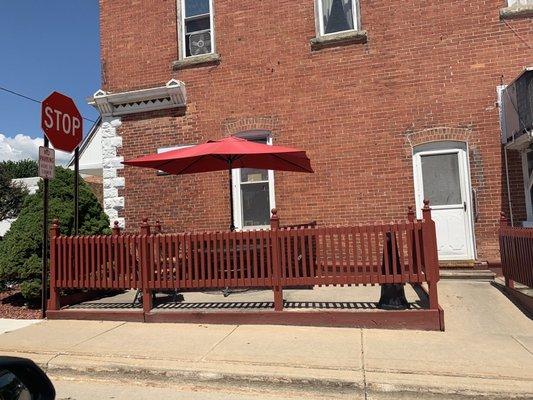 Side entrance and patio seating