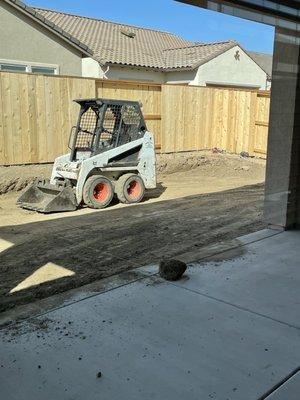 Preparing for a retaining wall in order to have a usable yard!