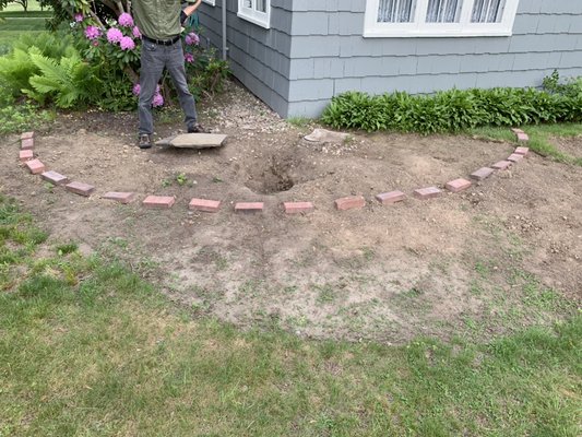 Planing out a garden bed.