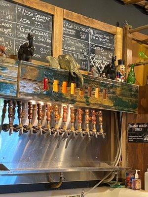 Love the elephant on that shelf above the beer tap handles.