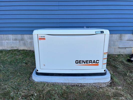 10kw Generac generator set on a GenPad concrete base.