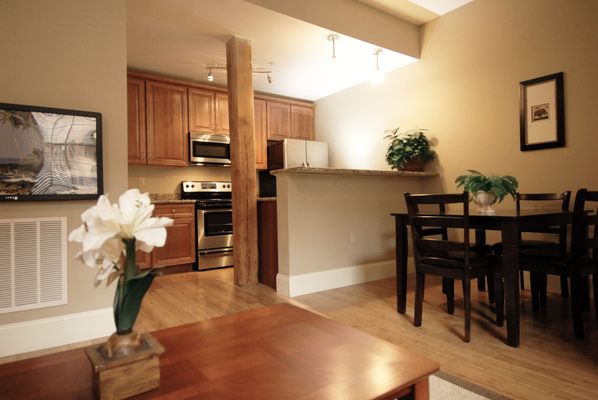 Sleek granite and stainless kitchens.