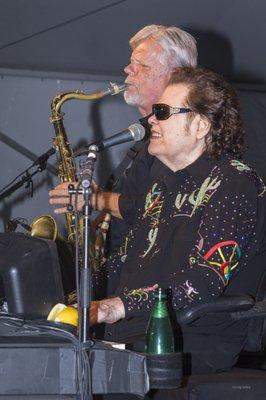 John with his Boss Ronnie Milsap on a live gig!
 www.songwriterdemo.com