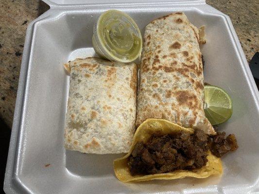 Lengua burrito and steak taco with verde salsa.