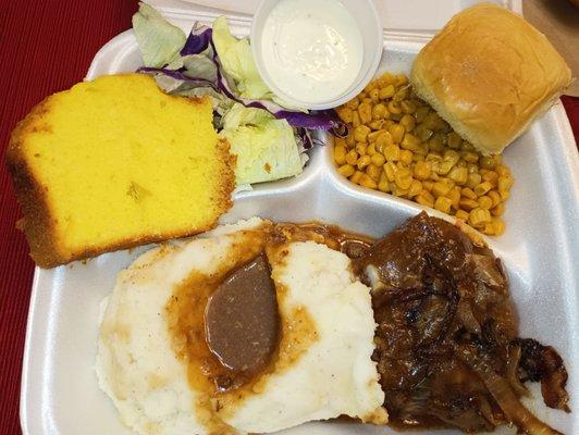 Hamburger steak, mashed potatoes, corn, salad with ranch, butter roll & lemon cake plate $10.99