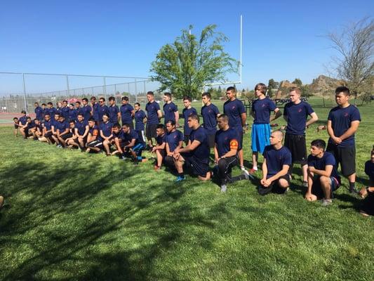 Future Marines (Poolees) engaging in a Drill Instructor event at River City High School