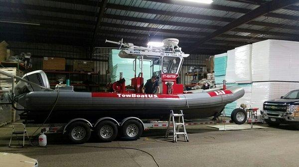 TowBoatUS Old River getting a new inflatable collar installed.