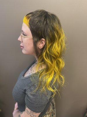 Balayage with yellow vivids. Customized cut.