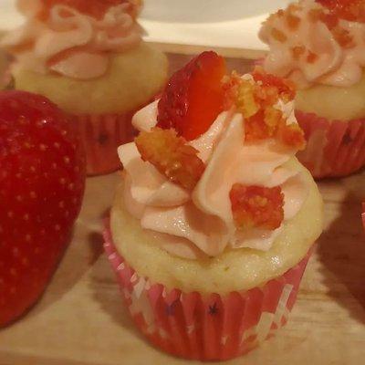 Strawberry Bliss : light and airy cupcake with Strawberry Jell-O buttercream topped with a Strawberry crunch