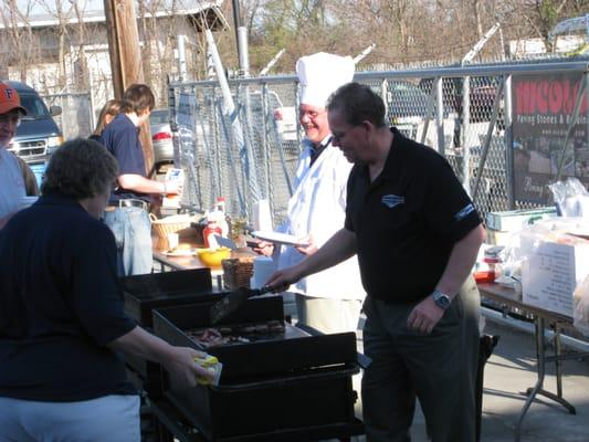 CT Stone employees serve up breakfast at our customer appreciation breakfast in April.