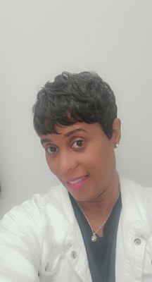 Short and sassy cut, healthy relaxer friendly style and a happy customer.