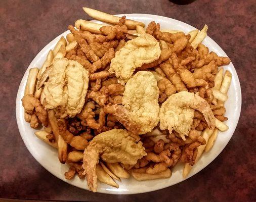 Seafood combo with fried shrimp and clams.