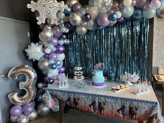 Sweets table including cake, cupcakes, cake pops and cookies all by Ana's Bakery.