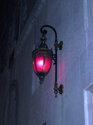 a red light on the side of the building (along Desales Street, NW)