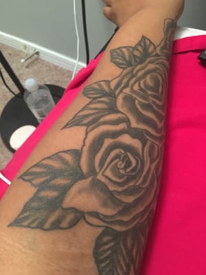 The roses were done by trigga the leaves on this side were recently added in July 2016