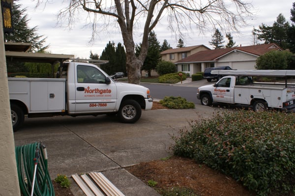 Northgate installers taking off the old doors