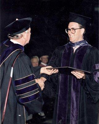 Steve receives his JD diploma on graduation day from McGeorge, May 1988