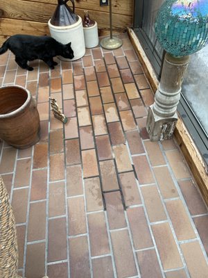 Soaked floor in sunroom