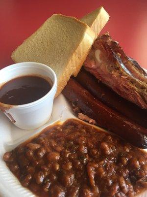 3 meat combo- ribs, hot link, brisket. Side- spicy baked beans