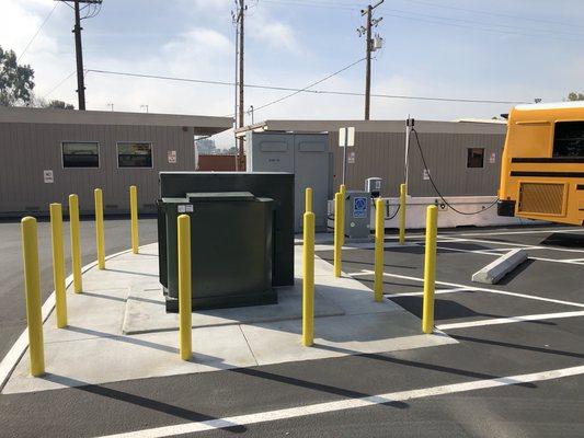 Flatwork and steel bollard installation for electric school bus charging station