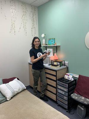 Licensed Massage Therapist in our newly painted and decorated room