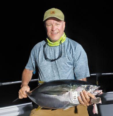 Yellowfin and a happy fisherman