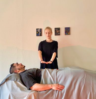 Sydney administering Reiki at FLIHH Holistic Wellness Studio in San Gabriel, CA