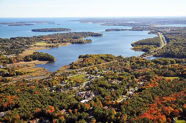 An aerial view of the OceanView campus with views of Casco Bay and the Presumpscot River Estuary.