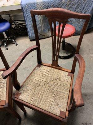 Refinished rush weave chairs.