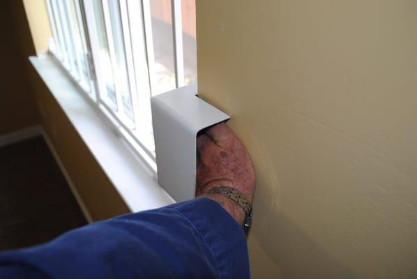 keyless fire escape window.  insert hand into box and "unlatch" window easily.  even a small child can unlock it.