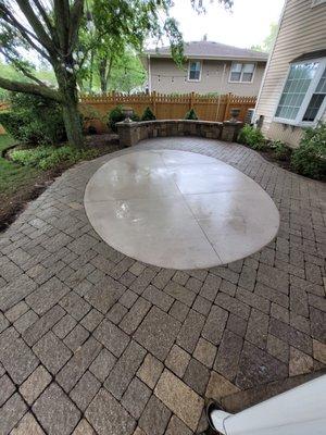 Concrete Patio extension , using only existing old brick pavers .