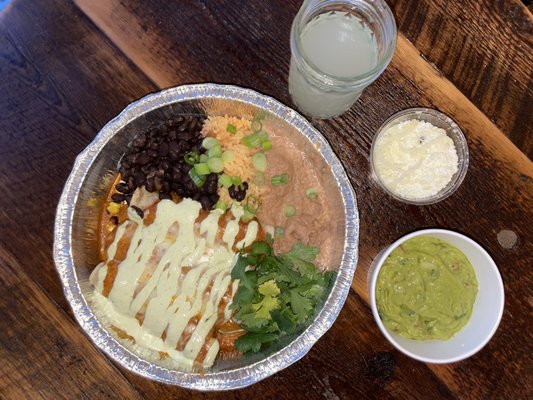 Enchiladas de mole (veggie style), classic margarita, side of shredded queso, side of guacamole,