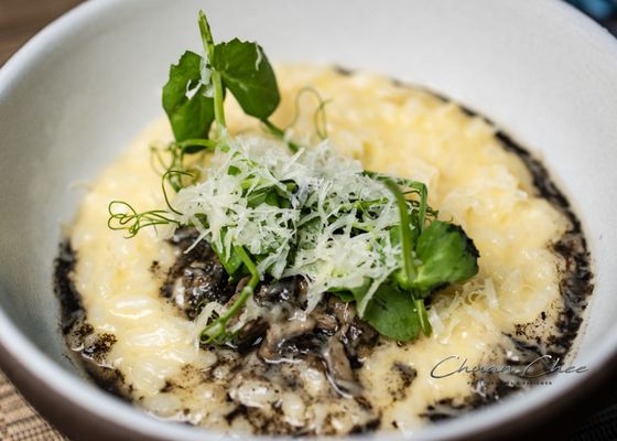 Truffle Huitlacoche Risotto, hen of the wood mushrooms, pea tendrils, mascarpone