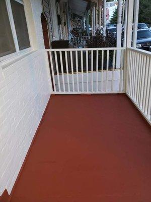 New porch floor and 1 coat of paint. So far looking great