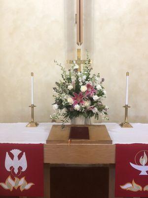 Flowers for the altar on Pentecost at Lamb of God in honor of Charlie! Thank you Flowerama!